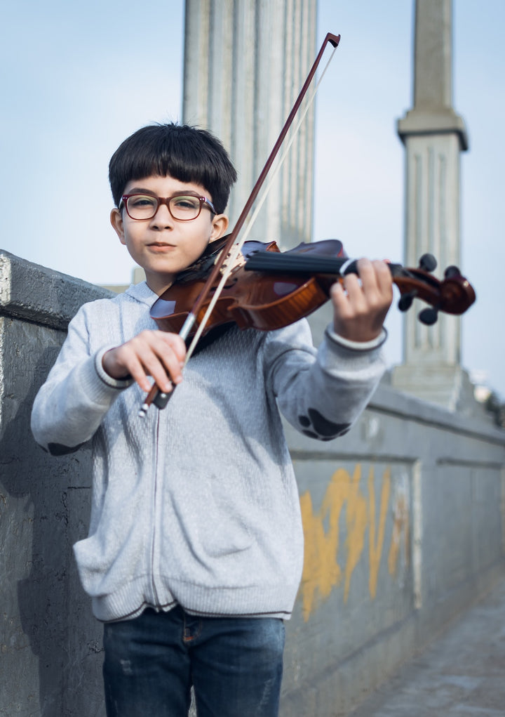 Child beginning violin lessons